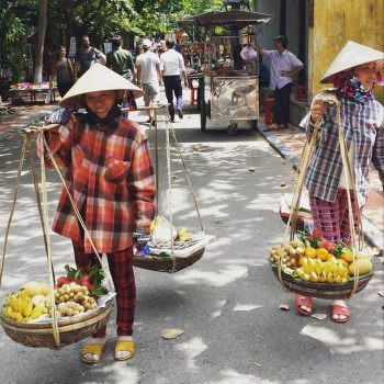 Vietnamese verkoopsters aan het werk in Hoi An