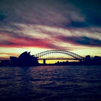 Zonsondergang met opera house en harbour bridge 