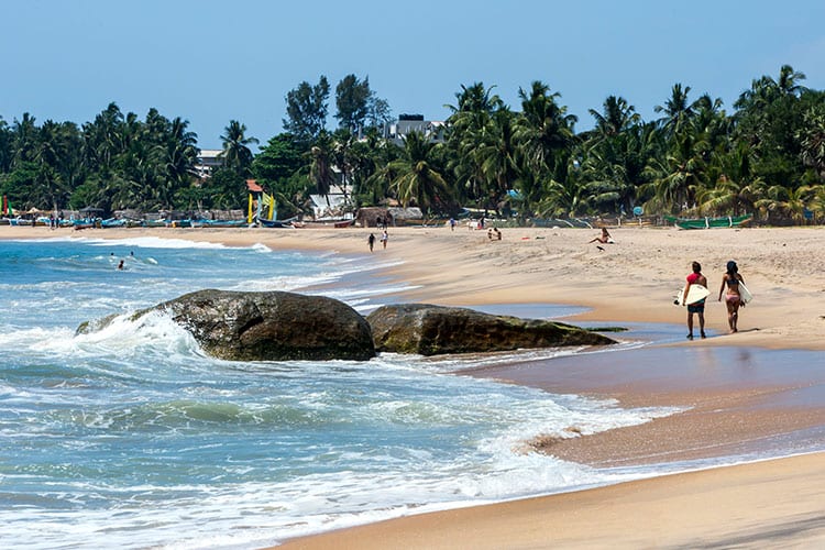 Surfers in Arugam Bay